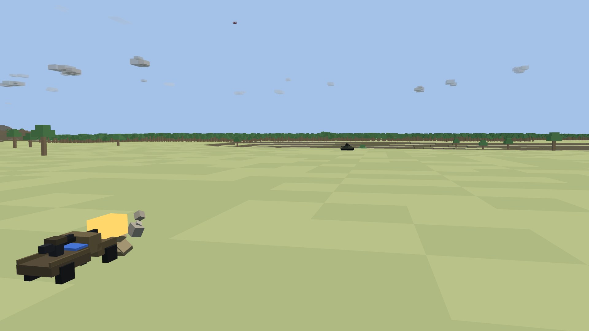 A gun truck at a treeline firing its recoilless rifle at a burning tank on the open steppe