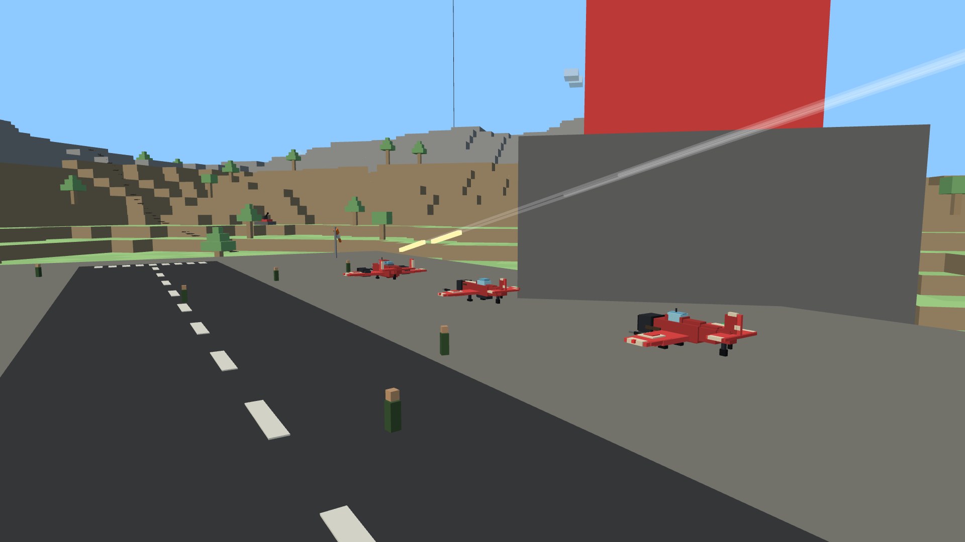 A row of parked reserve fighters on the grass beside a team's tower, an enemy fighter rolling in on them trailing tracer